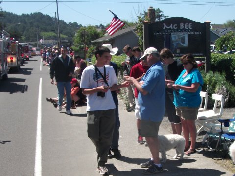 Handing at tracts at a July 4th parade